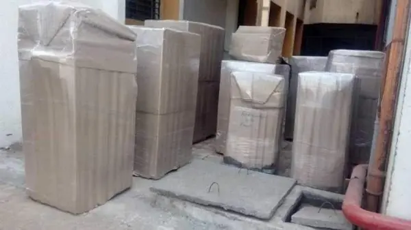 Furniture sealed in stretch film before loading