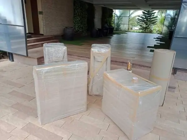 Cardboard-covered furniture in a building lobby