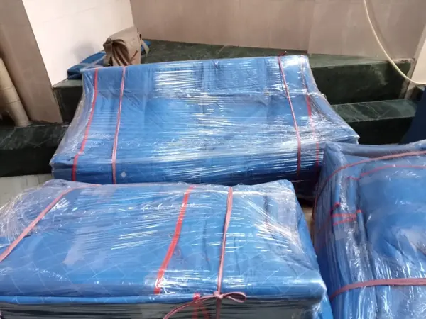 Sofa set taped and wrapped for a long journey