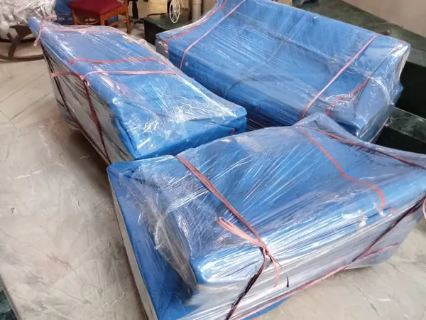 Sofa protected with blue waterproof cover