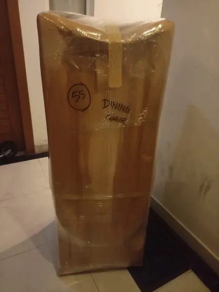 Tall appliance packed upright in a carton