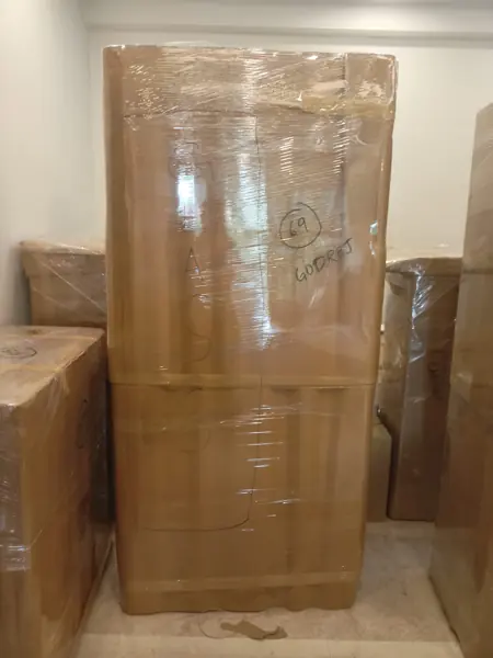 Wardrobe wrapped in corrugated sheet